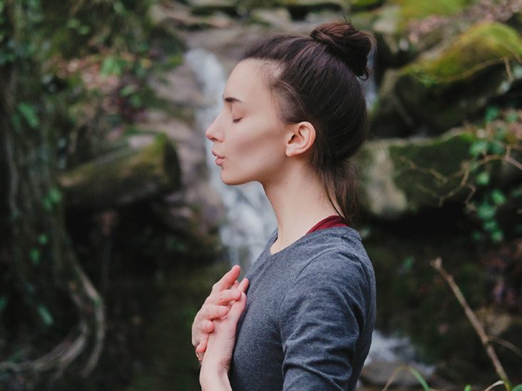 Young-woman-practicing-breathing-pranayama for irregulation movement