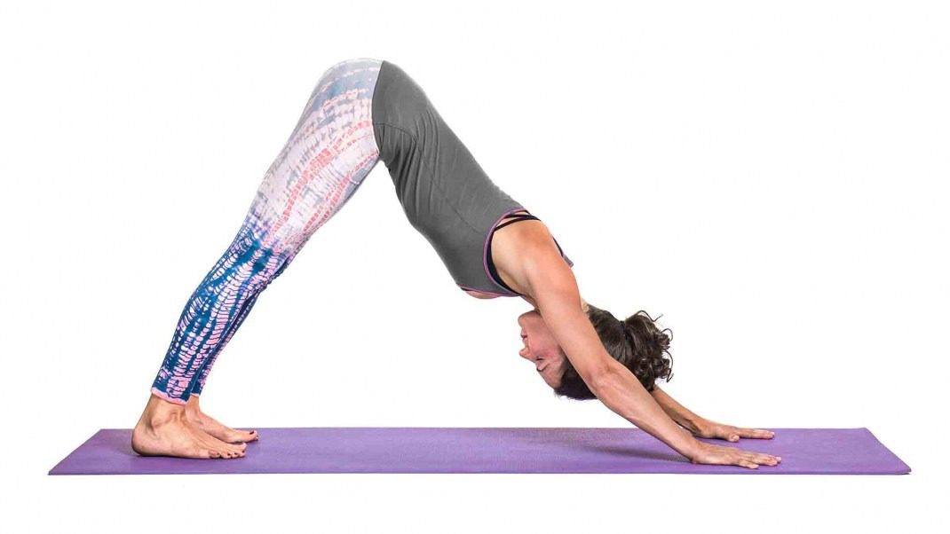 A man do Downward facing dog Poses