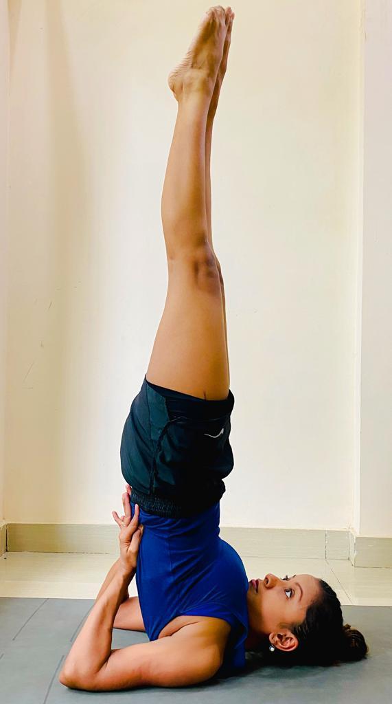 A lady practicing postures