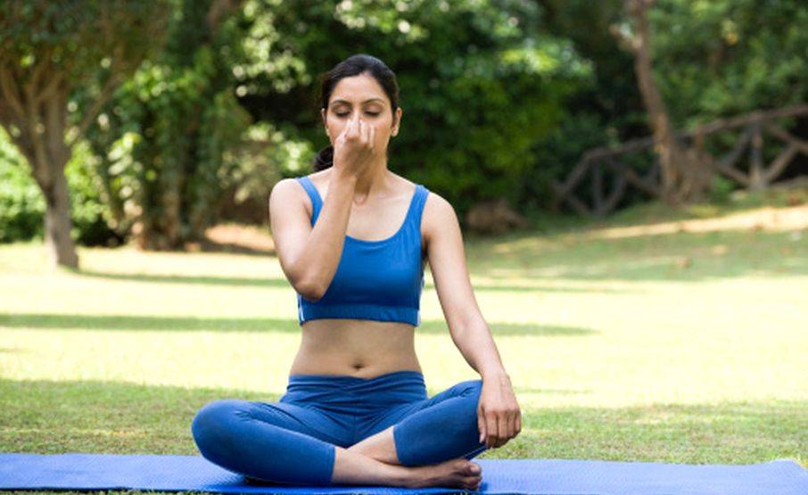 A group of women practicng pranayama for inhale and exhaltionHealthy heart
