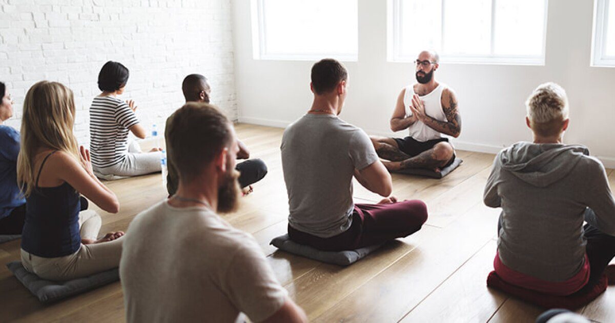 A yoga Teacher Practicing meditation for all the students for sharp mind