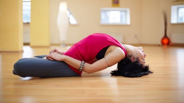 A women practicing yoga