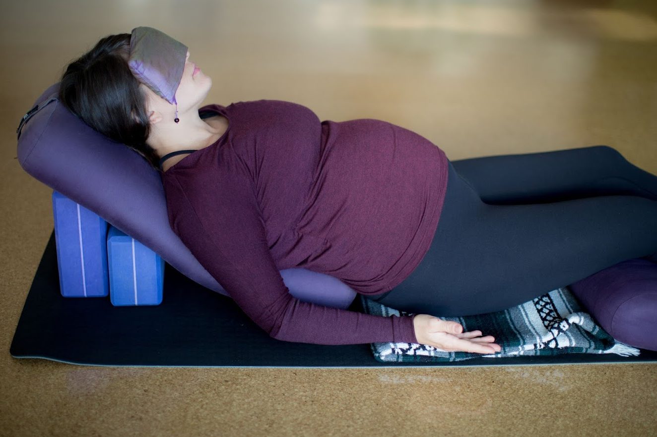 A pregnant lady do yoga nidra